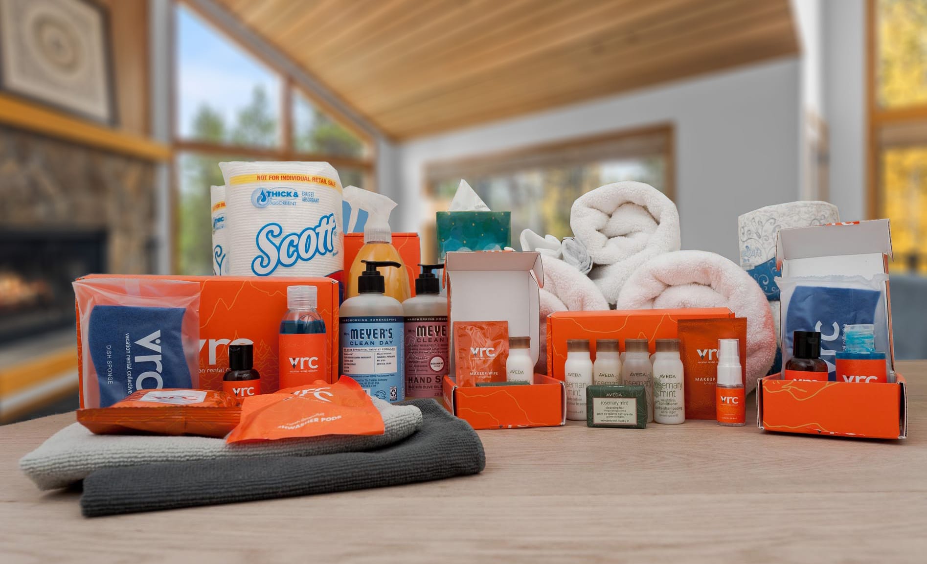 Guest-accessible cleaning supplies stored neatly in the utility area