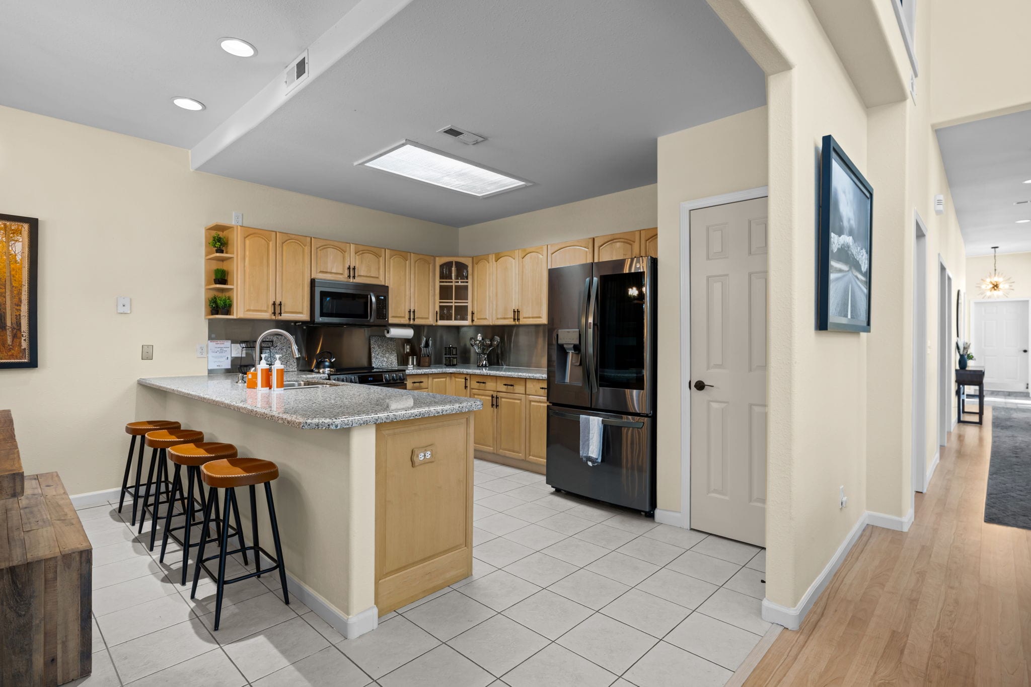 Kitchen detail showing guest-ready appliances and cookware