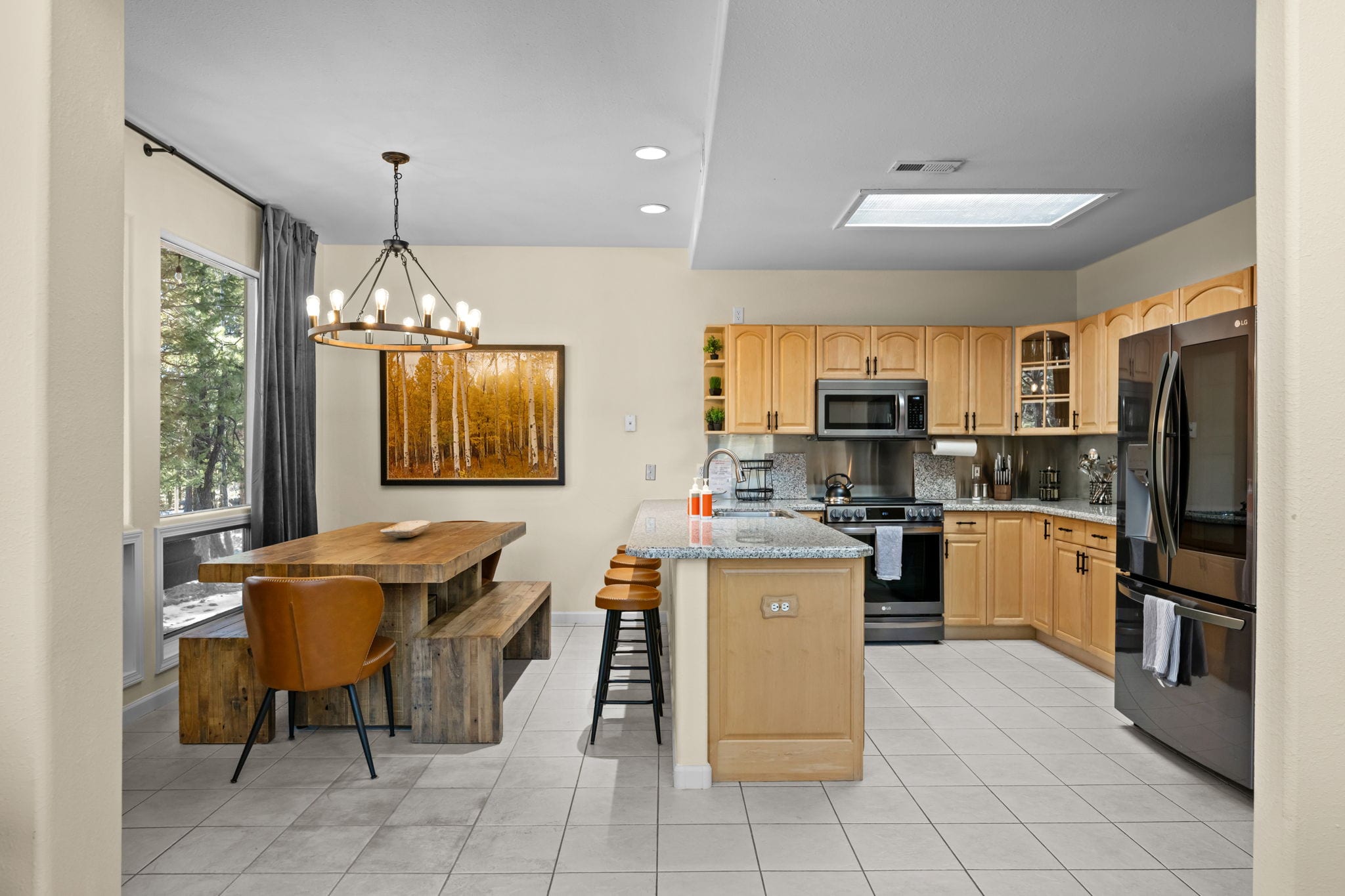 Kitchen workspace with appliances, storage and granite counters
