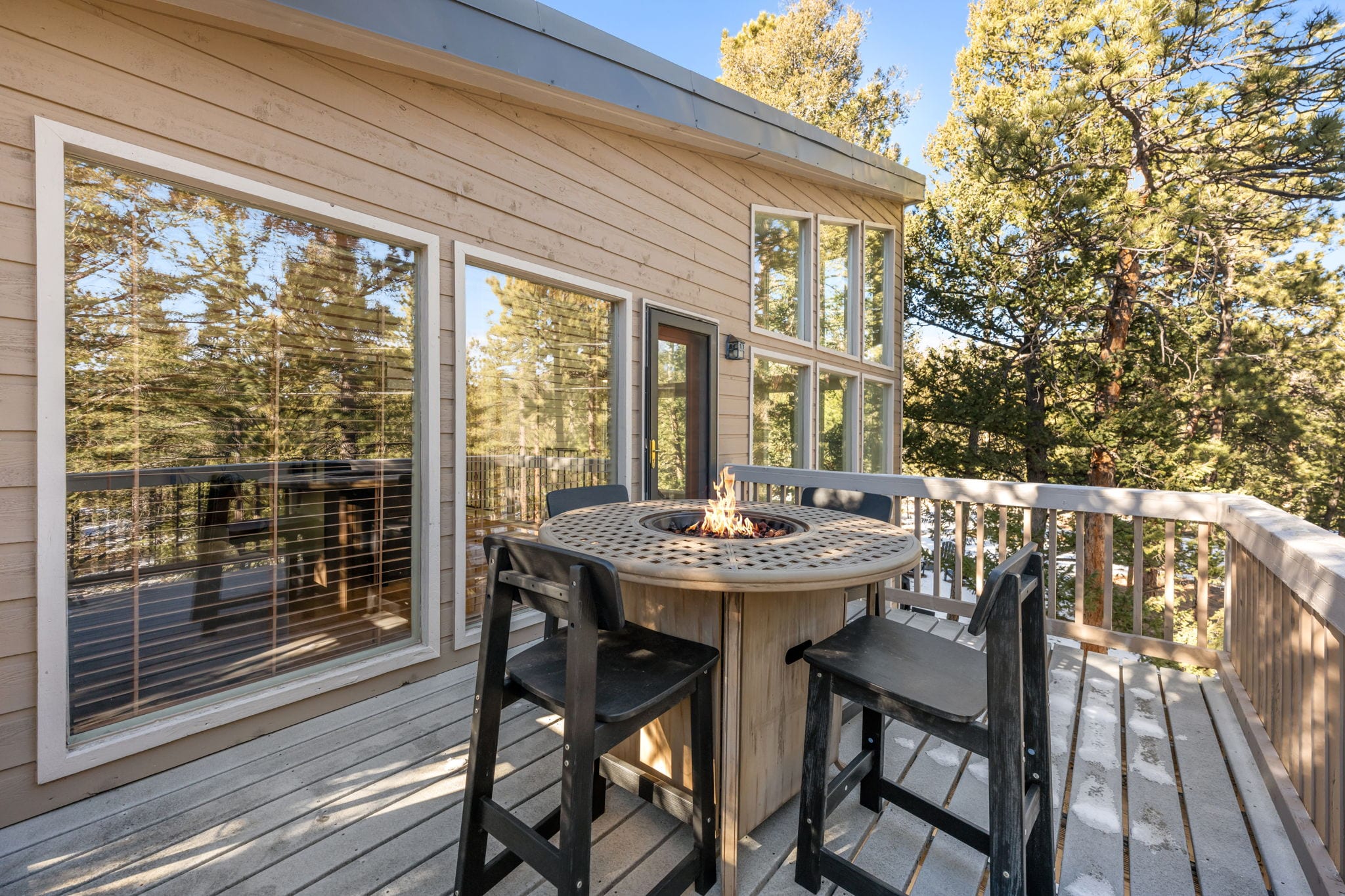 Private upstairs deck with seating among the treetops